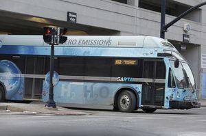 A hydrogen fuel cell bus leaving transit center.