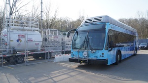 picture of a hydrogen fuel cell next to NICE America H2 refueling system.