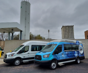 A picture of 2 hydrogen fuel cell vans